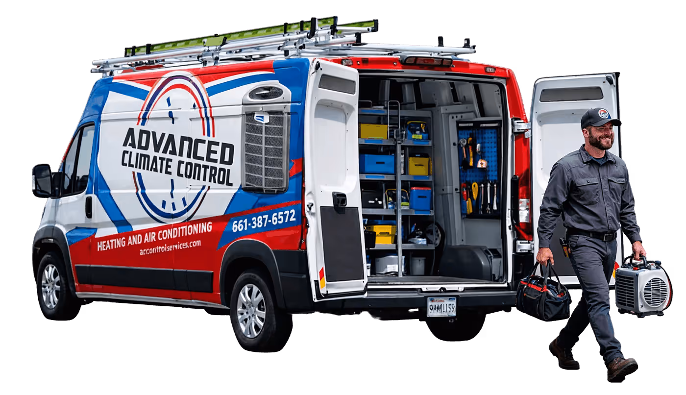 Advanced Climate Control HVAC technician stepping out of service van ready to help Bakersfield customers